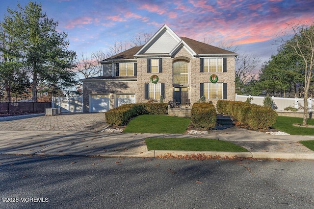 front of property with a garage