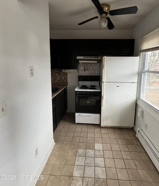 kitchen with white appliances, a baseboard heating unit, ventilation hood, decorative backsplash, and light tile patterned flooring