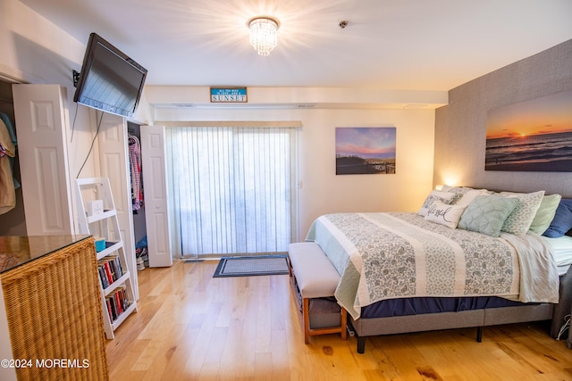 bedroom with light hardwood / wood-style floors