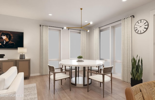 dining space with light wood-type flooring