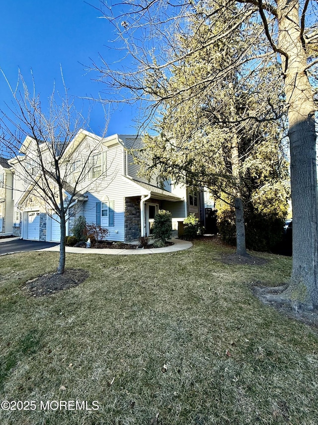 view of home's exterior with a lawn