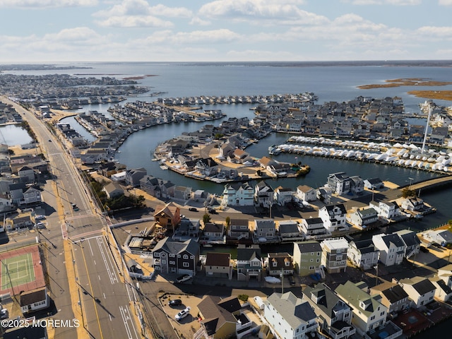 bird's eye view with a water view