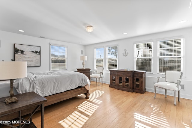 bedroom with light wood-type flooring