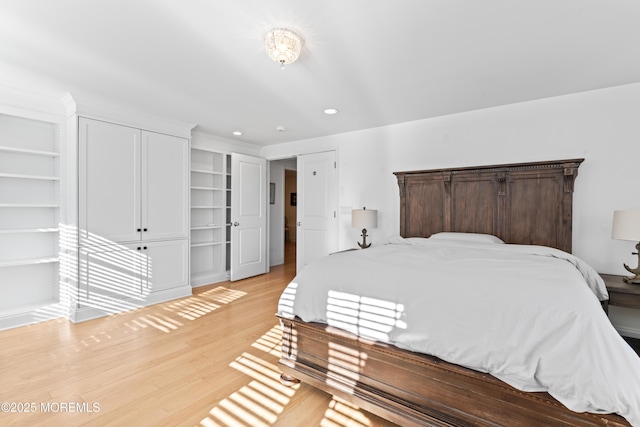 bedroom with light hardwood / wood-style floors