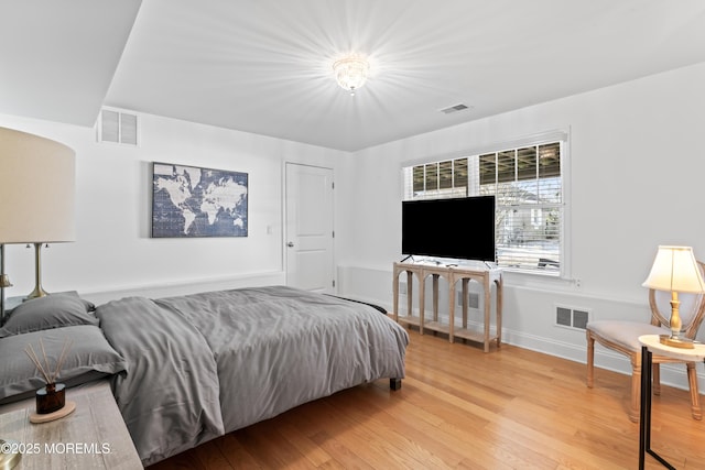 bedroom featuring hardwood / wood-style floors