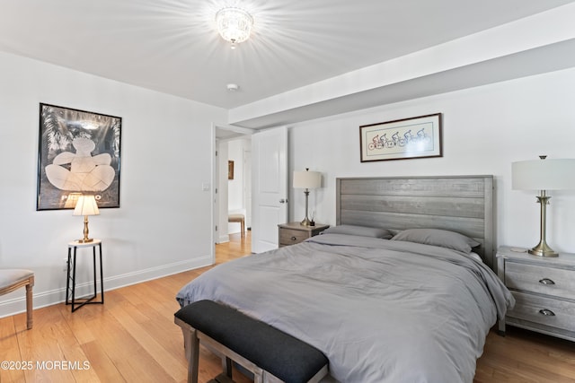 bedroom with wood-type flooring