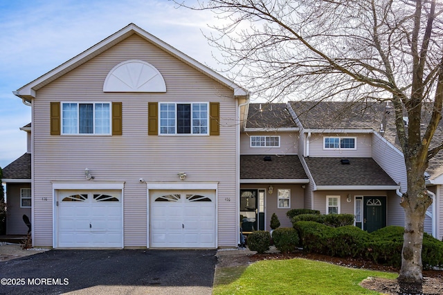 view of front property with a garage