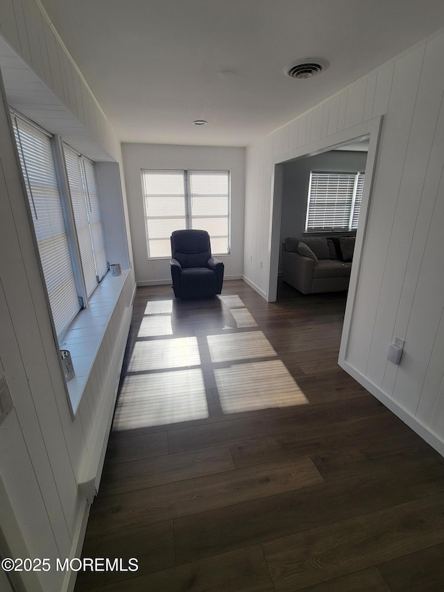 unfurnished room featuring dark hardwood / wood-style floors