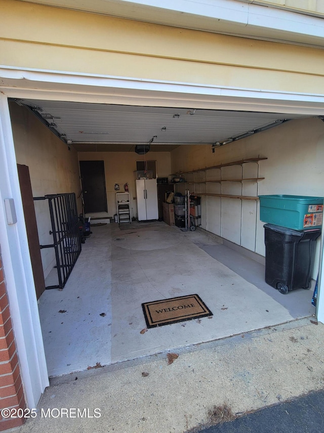 garage with white fridge