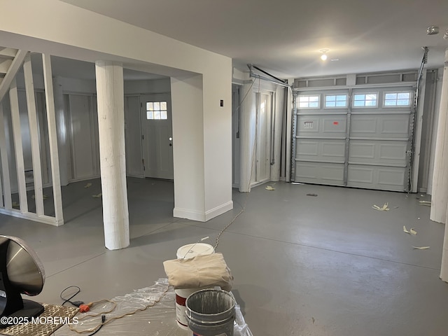 garage with baseboards