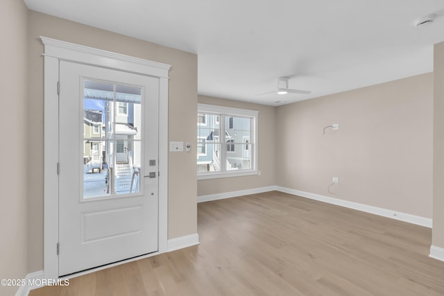 entryway featuring light hardwood / wood-style floors and ceiling fan