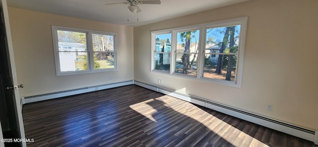 unfurnished room with ceiling fan, dark wood-type flooring, and a baseboard radiator