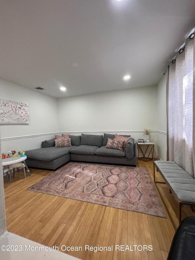 living room with hardwood / wood-style flooring