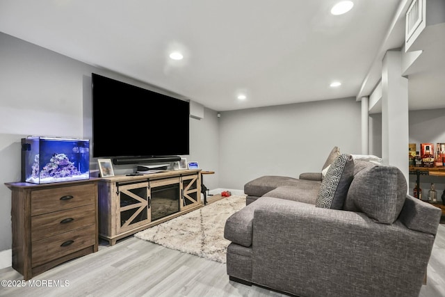 living room with light hardwood / wood-style floors