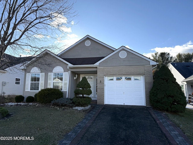 ranch-style home with a garage