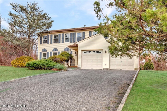 view of front facade with a front yard