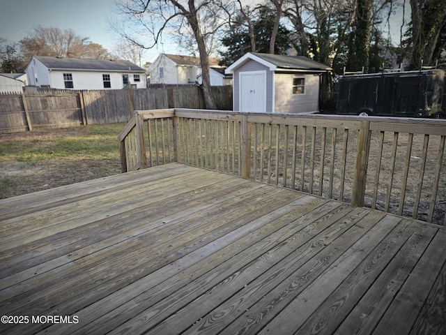 deck featuring a shed