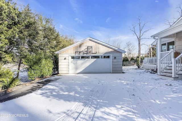 view of snow covered garage