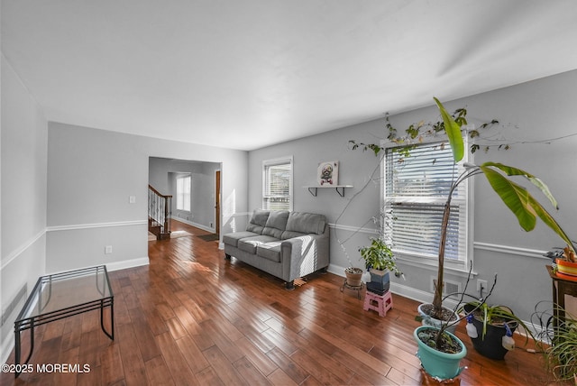 living room with dark hardwood / wood-style floors