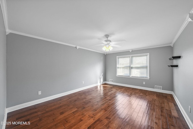 unfurnished room with ceiling fan, ornamental molding, and dark wood-type flooring