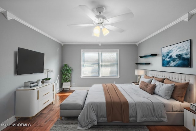 bedroom with dark hardwood / wood-style flooring, ceiling fan, and crown molding