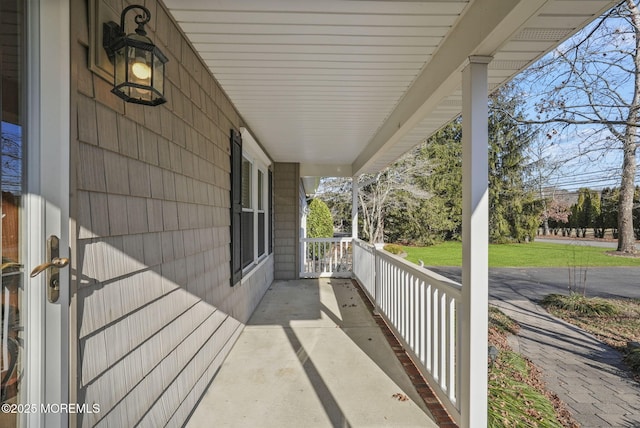 view of patio featuring a porch