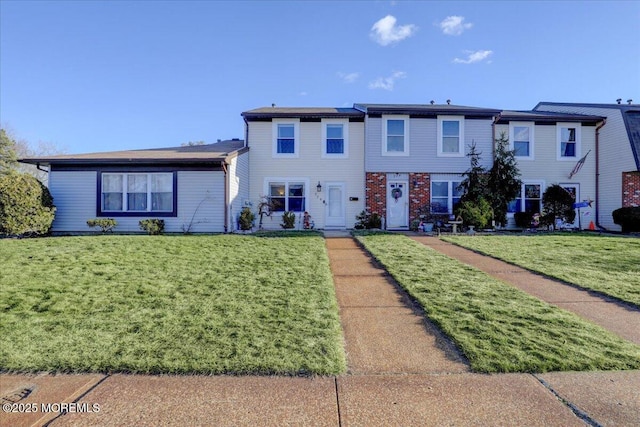 view of front of property with a front lawn