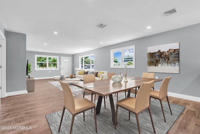 dining room with light hardwood / wood-style floors