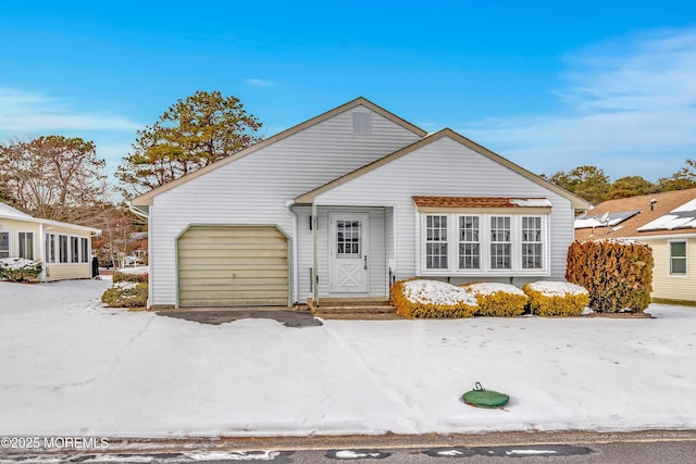 view of front of home with a garage