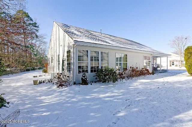 view of snow covered property