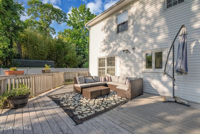 wooden terrace featuring outdoor lounge area