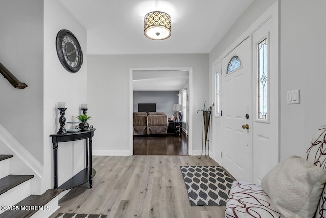 entrance foyer with light hardwood / wood-style flooring