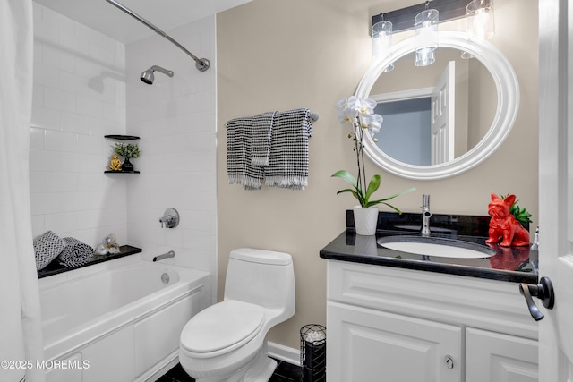 full bathroom with shower / bath combination, vanity, and toilet