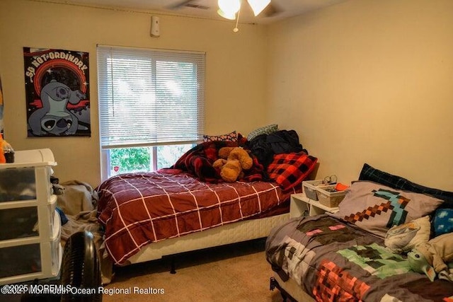 bedroom featuring carpet flooring and ceiling fan