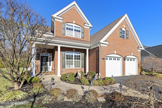 view of front of property with a garage