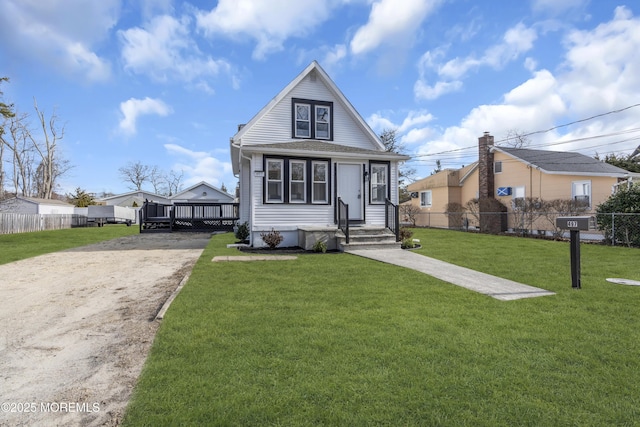 view of front of house featuring a front lawn