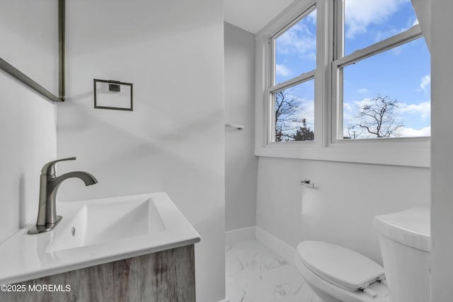 bathroom with sink and toilet