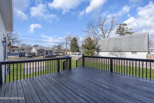 wooden terrace with a yard