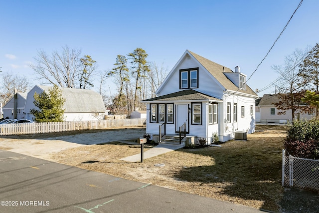 view of front of property with central AC unit