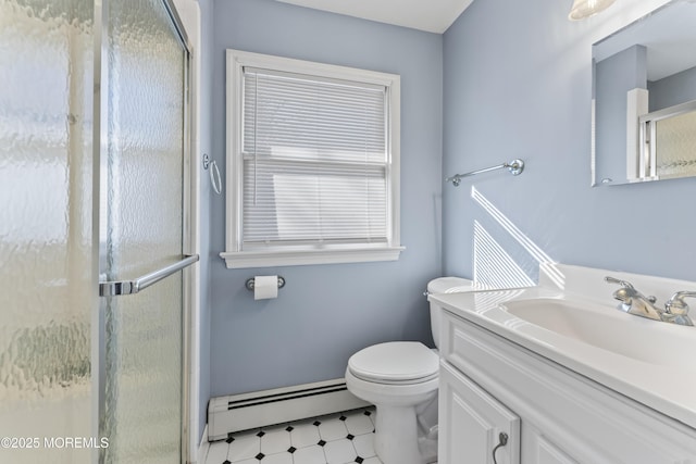 bathroom featuring toilet, a shower with door, a baseboard radiator, and vanity