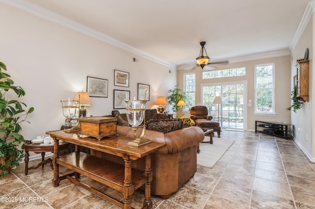 living room with ceiling fan and crown molding