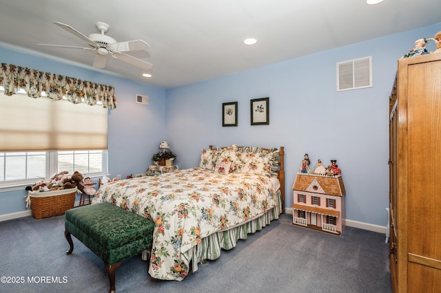 bedroom featuring ceiling fan and dark colored carpet