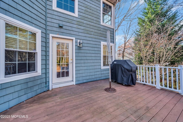 wooden deck with area for grilling