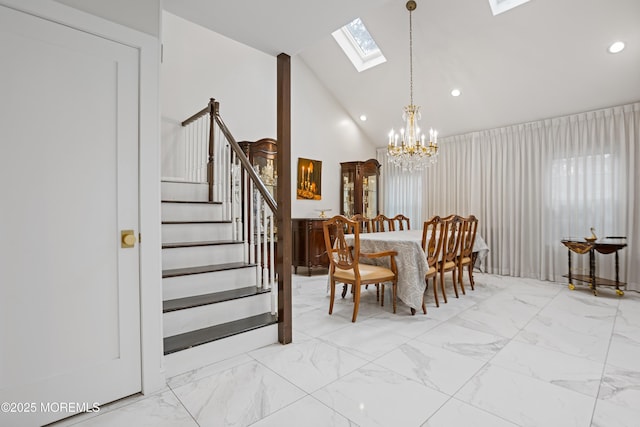 dining area with lofted ceiling and a chandelier