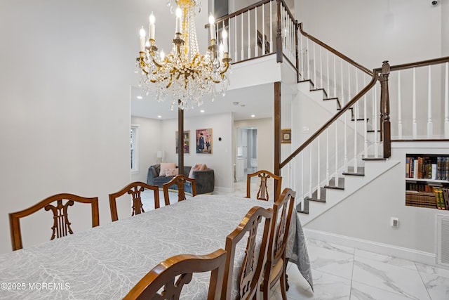 dining space featuring a chandelier