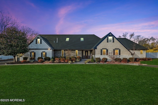 view of front of home featuring a yard