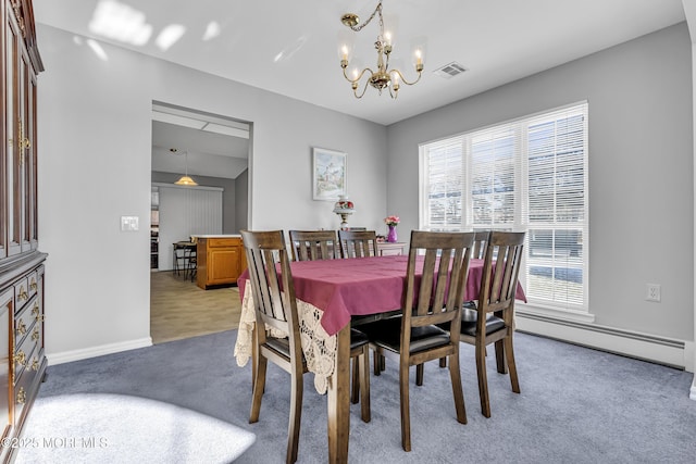 dining space with baseboard heating, light carpet, and a chandelier