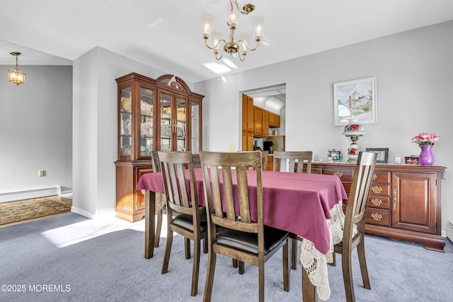 dining room featuring a baseboard radiator, a notable chandelier, and light colored carpet