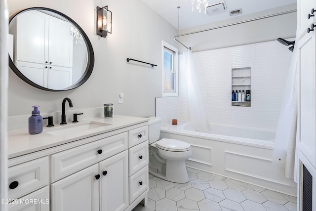 full bathroom with vanity, shower / bathtub combination with curtain, and toilet