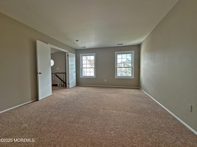 view of carpeted spare room